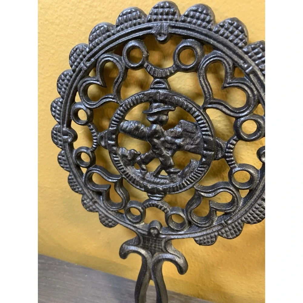 Two Fancy Vintage Cast Iron Trivets Black J.Z.H Amish Boy Girl 1952